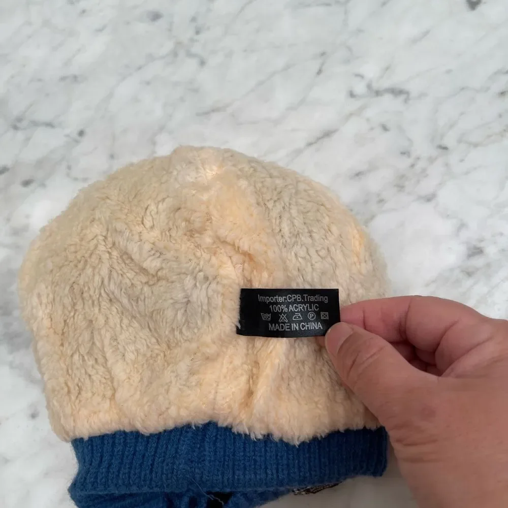 New infant’s knit hats with faux fur inner